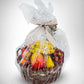 A beautifully wrapped Fruit Basket with seasonal fruits, perfect for gifting any occasion. Flowers optional from local florist.