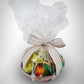 Seasonal Fruit Basket wrapped with clear plastic and a ribbon, perfect gift from a local florist in Canton.